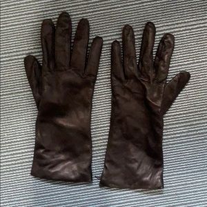 Genuine leather. 100% Cashmere Lined